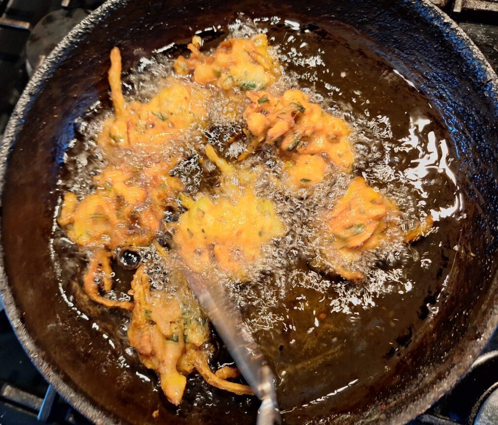 Deep frying the pakora batter