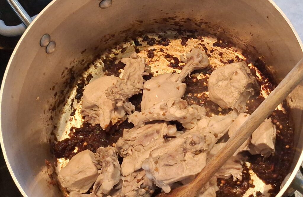 Chicken added to browned onions