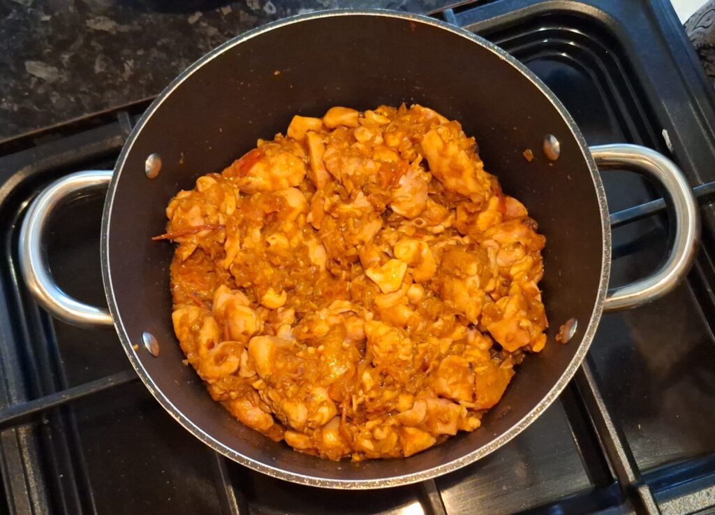 Chicken browned in spices and tomatoes