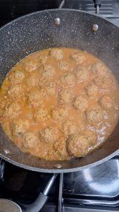 Koftas flipped over in masala