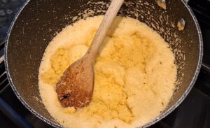 Stirring the coarse semolina into the butter