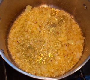 Lightly brown onions in the ghee