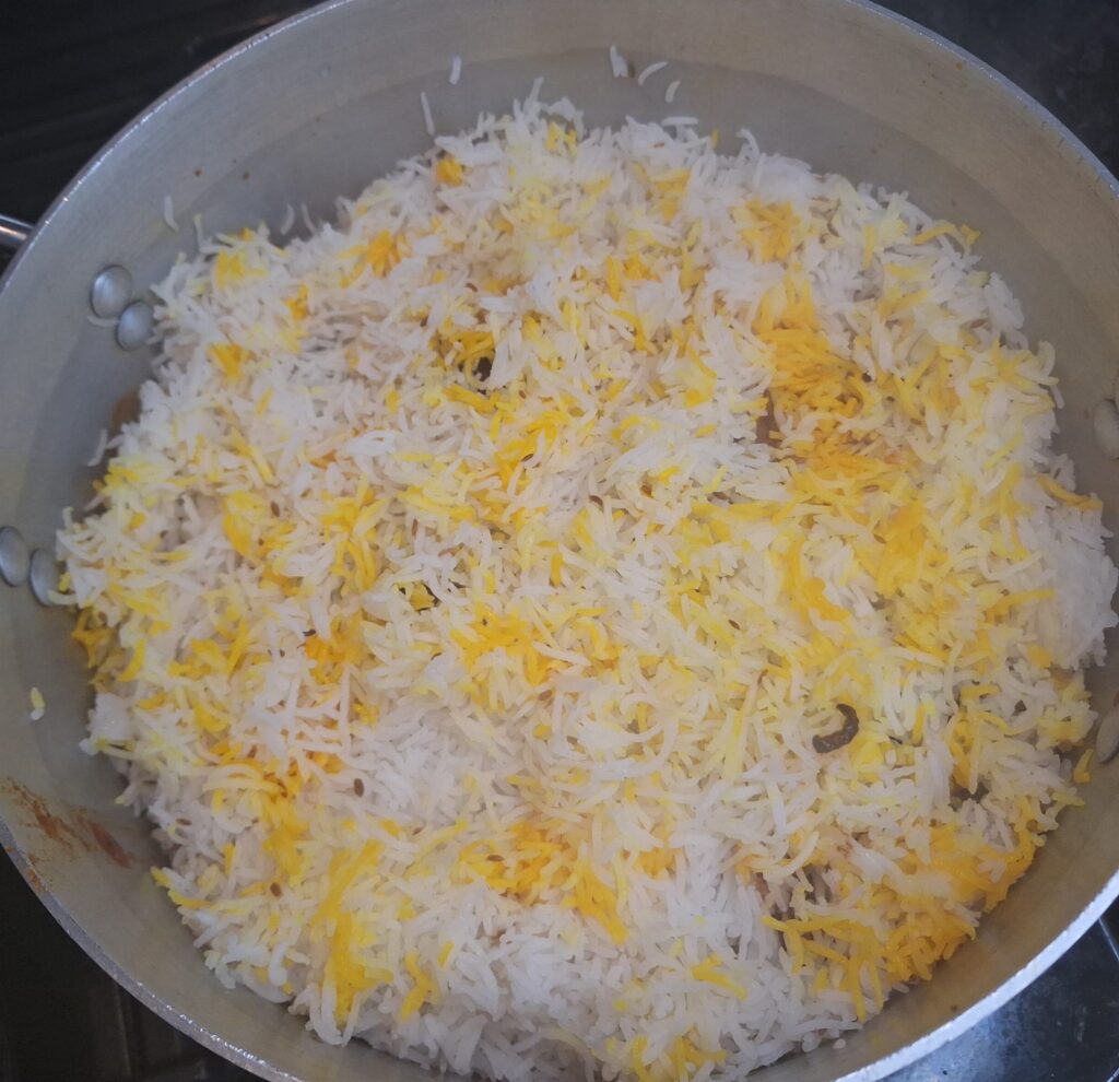 Rice with yellow food colouring applied