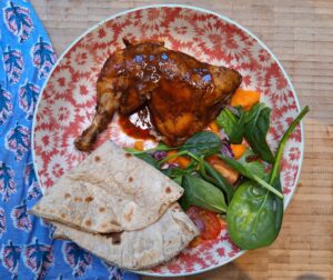 Chicken leg with salad