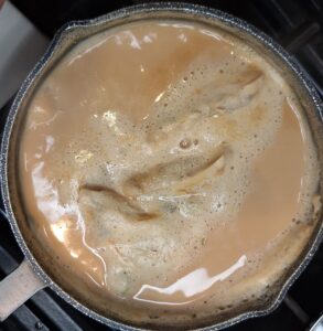 Add sugar to pan and simmer