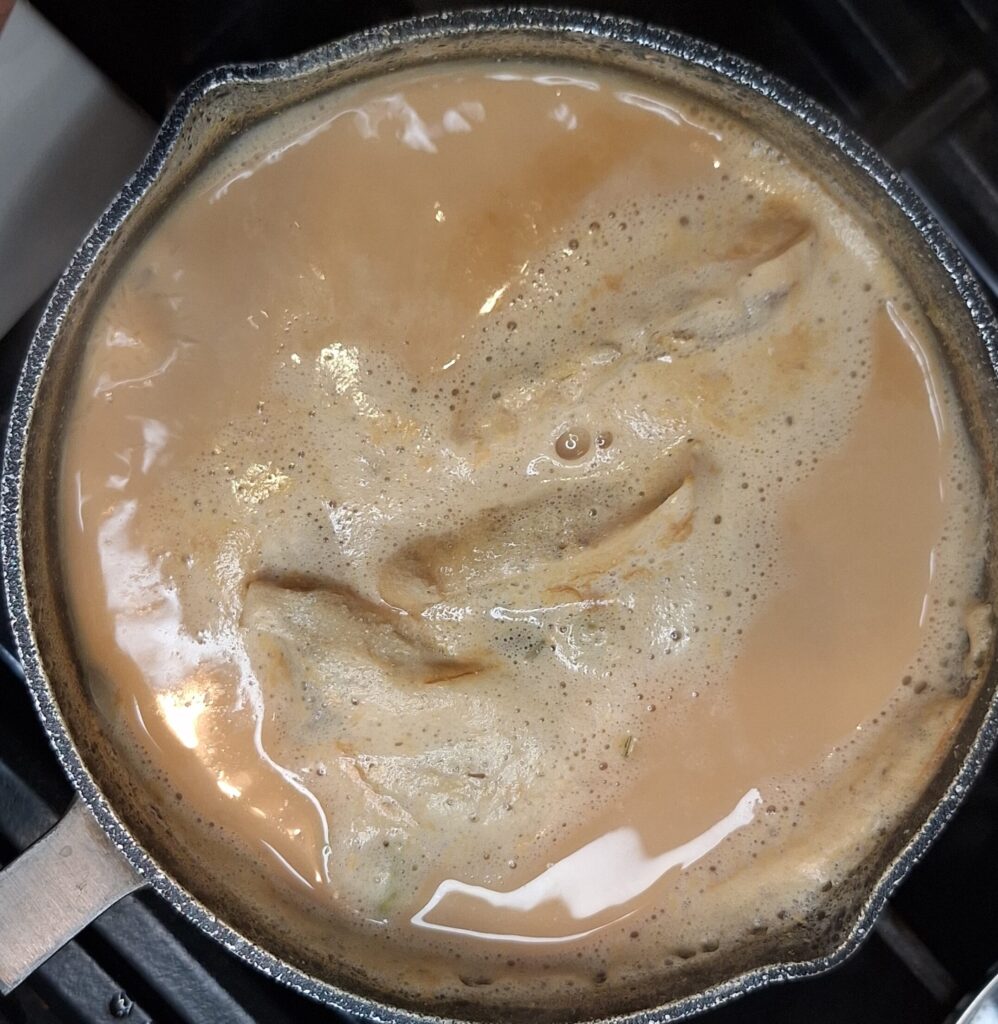 Add sugar to pan and simmer