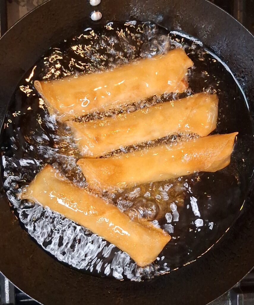 Frying spring rolls