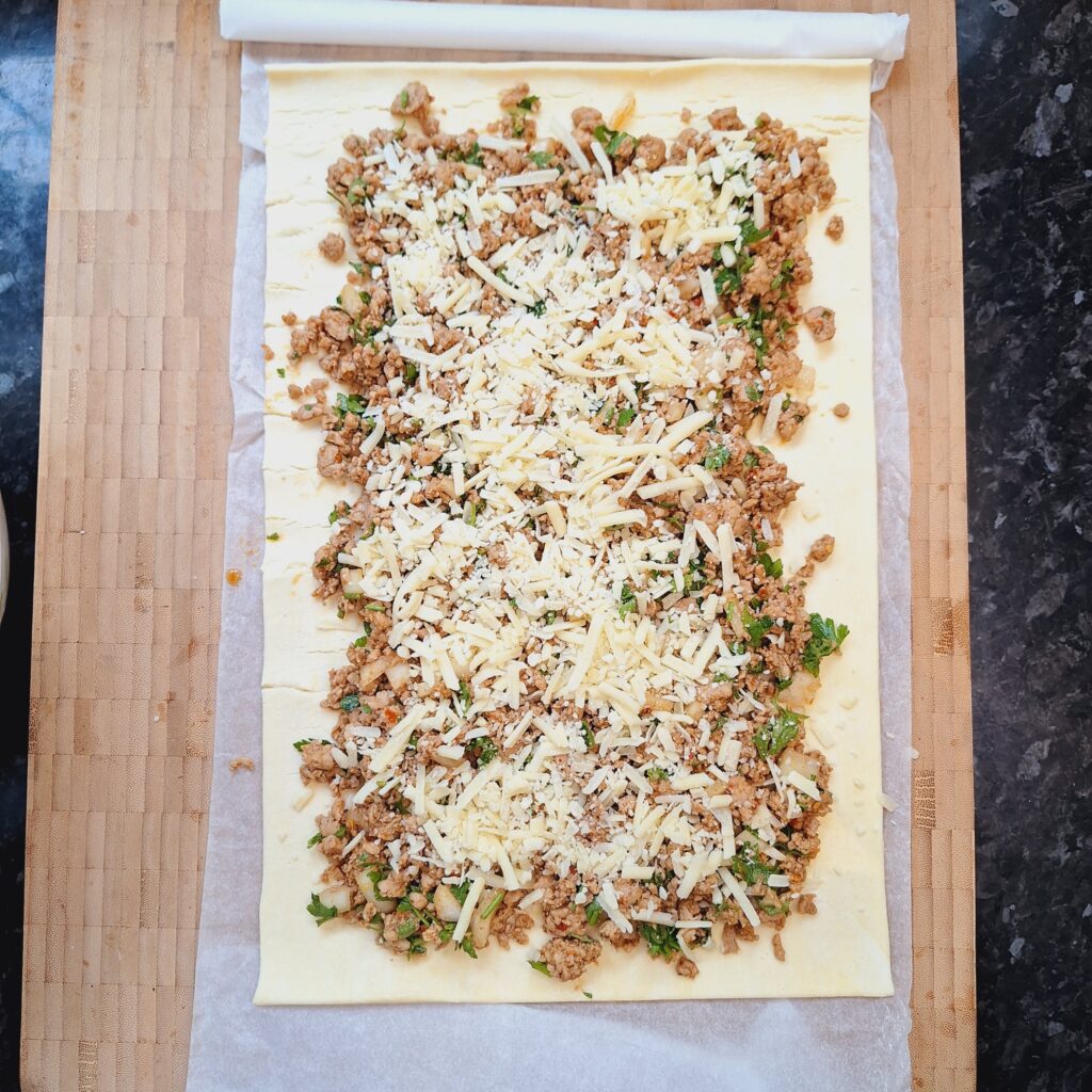 Puff pastry, layered with mince and cheese
