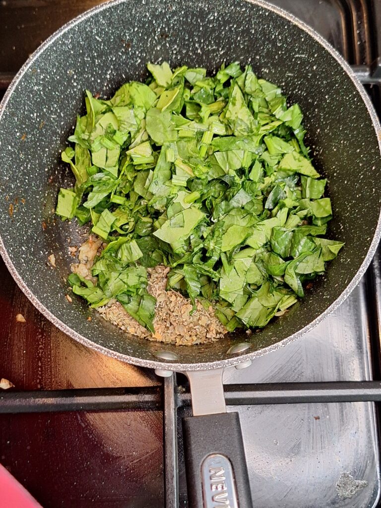 Add fresh palak to the pan