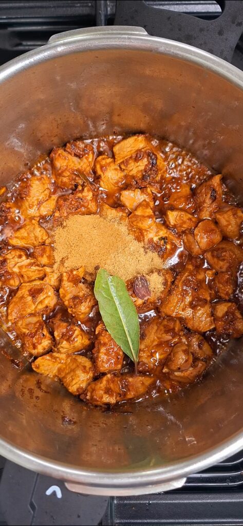 Add spices for Pakistani Lamb Curry