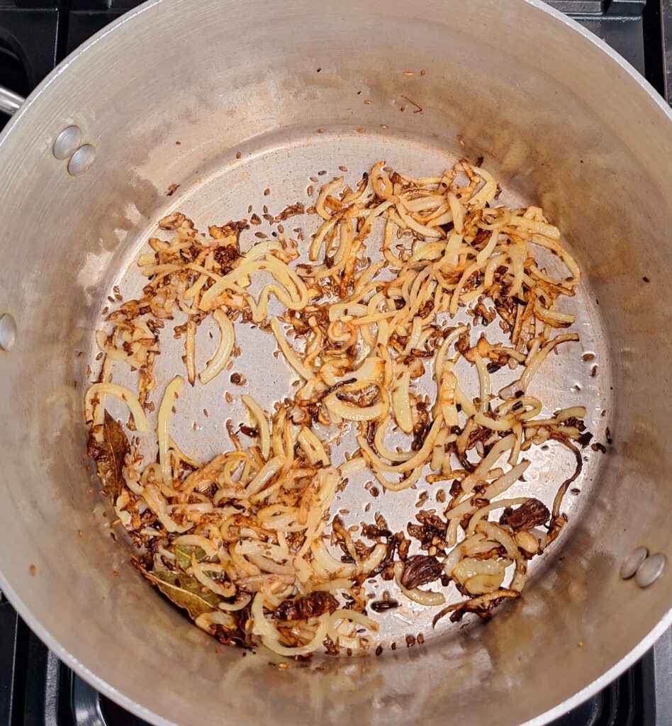 Fry onions until softened and light brown