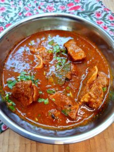 Lamb shorba garnished with fresh coriander