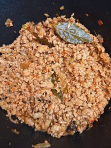 Cook mince in the whole spices
