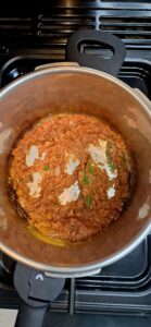 simmer spices and tomatoes