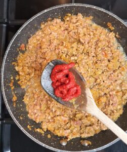 Brown keema and add tomato puree