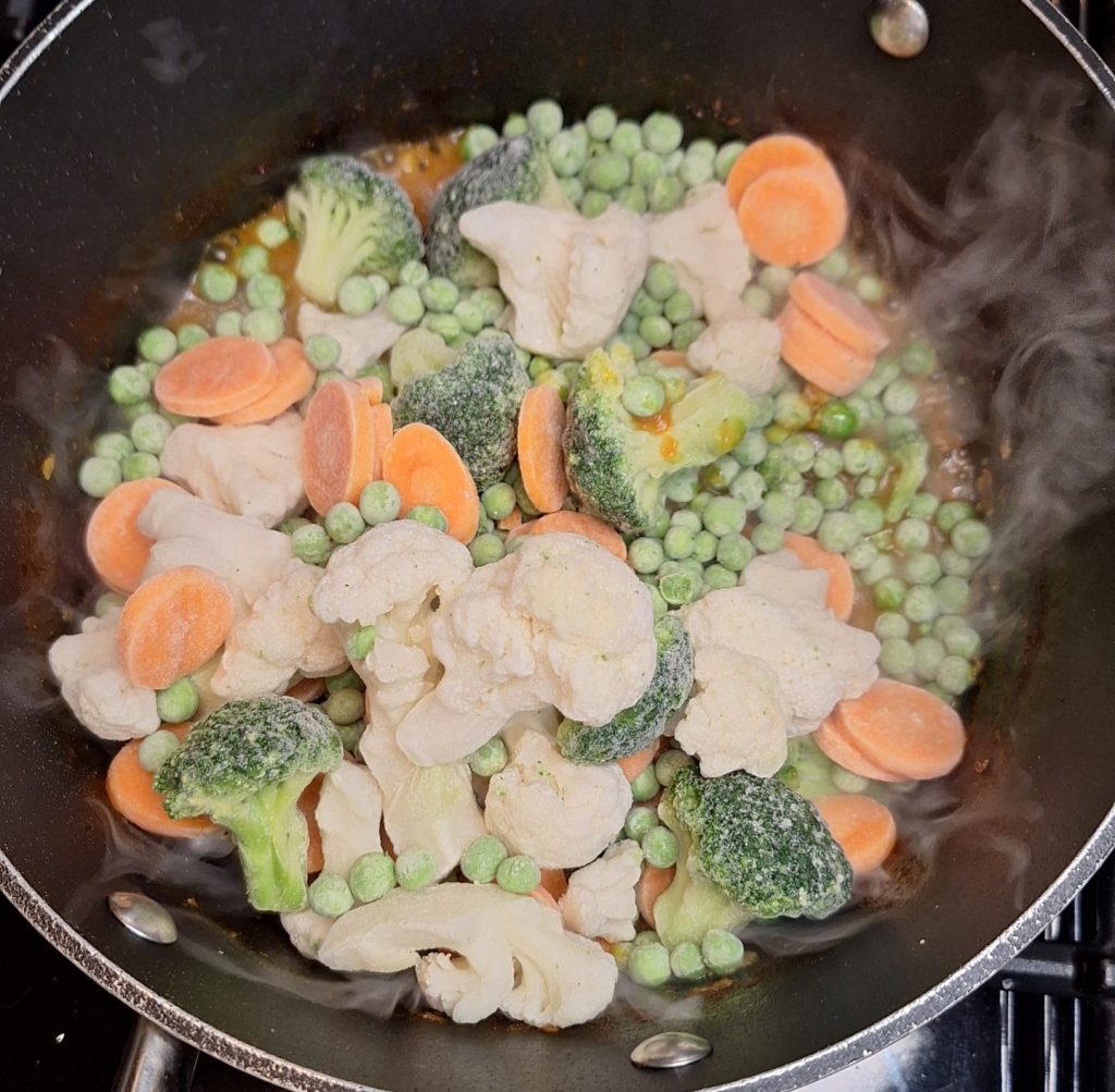 Add frozen vegetables