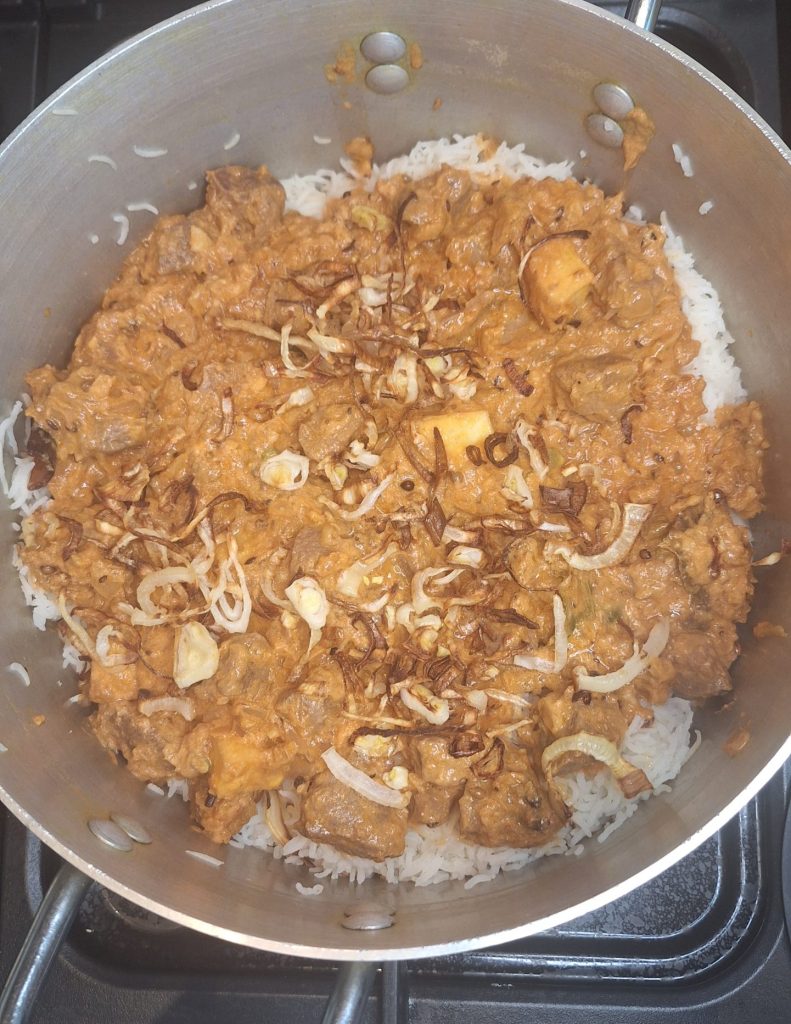 add lamb with crispy onions