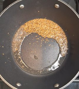 Heat oil, mustard seeds and cumin seeds