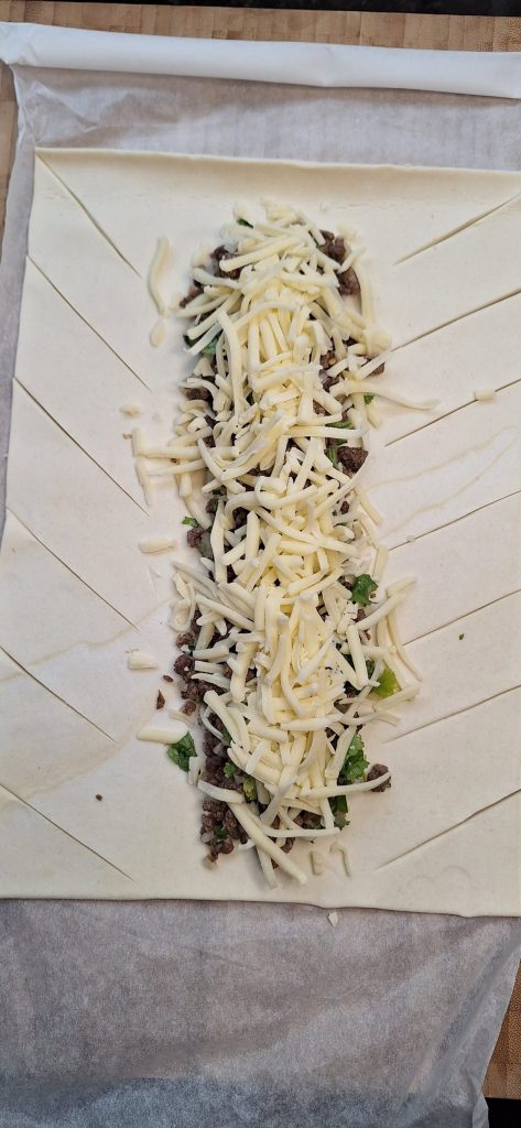 Cover with grated cheese