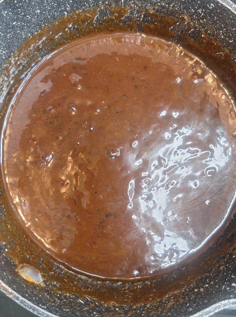 Add double cream and stir through
