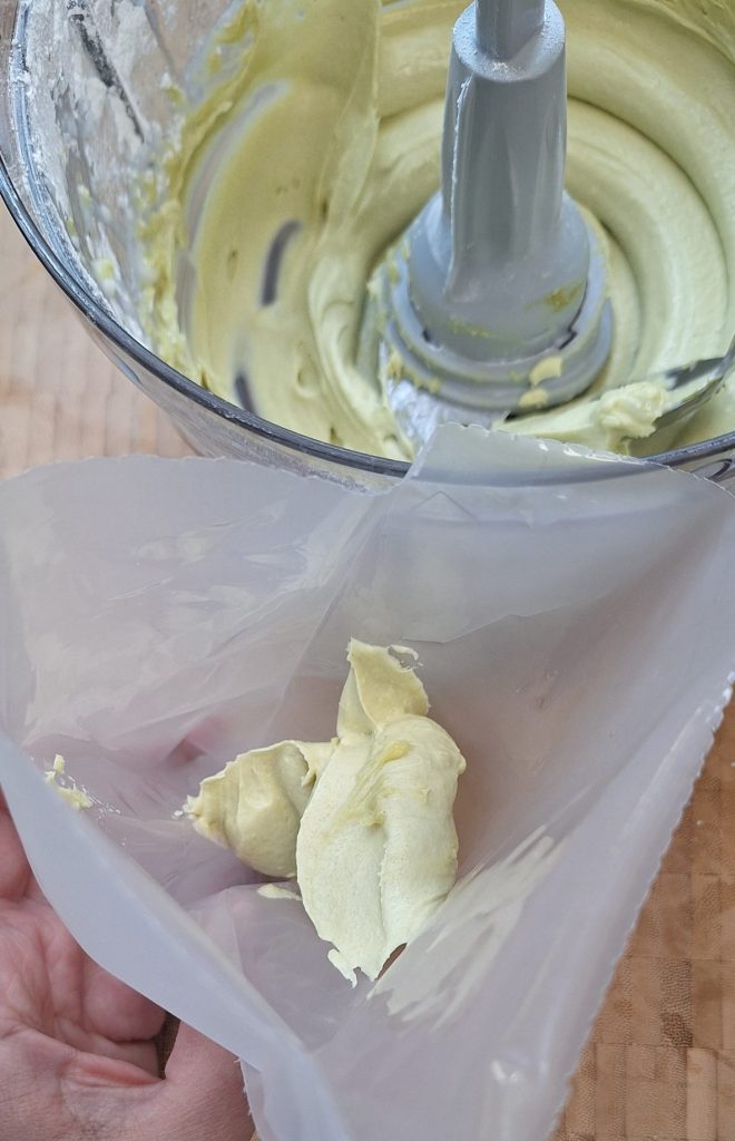 Add frosting to piping bag