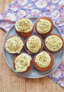 Add pistachio frosting to cupcakes