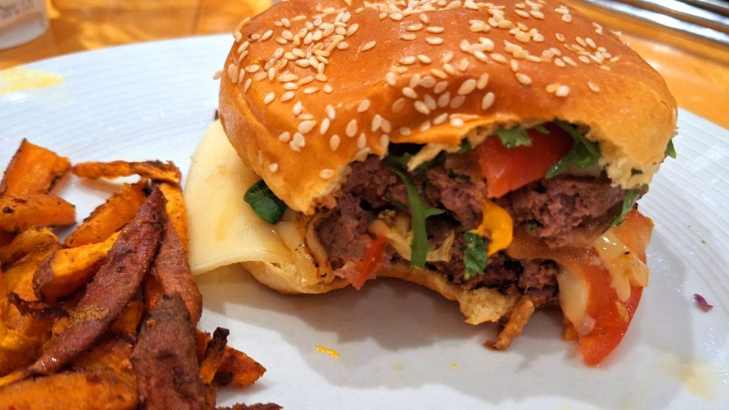 Spicy beef burger with sweet potato fries