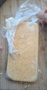 Remove cling film from ice cream