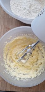 Whisk ghee and icing sugar