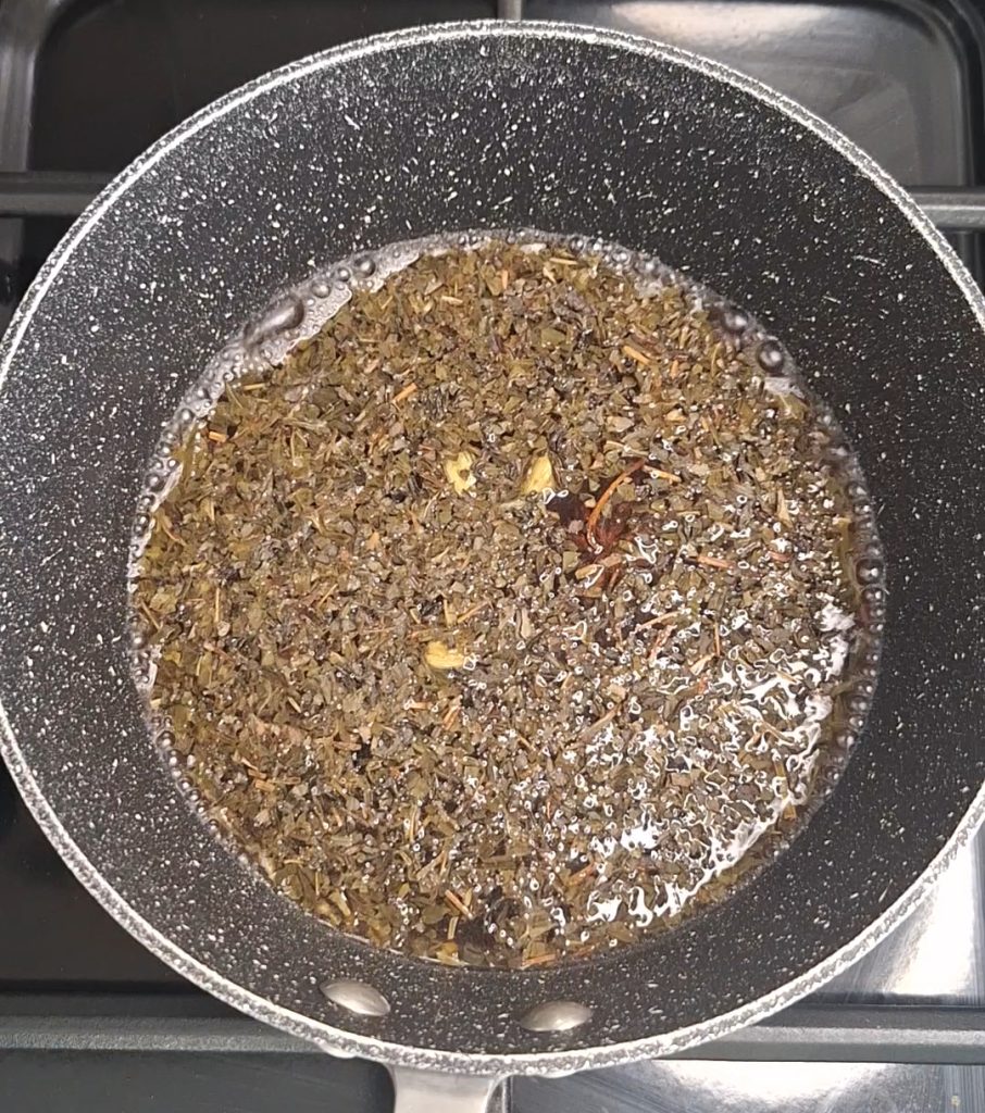 Add tea leaves, star anise, cardamoms
